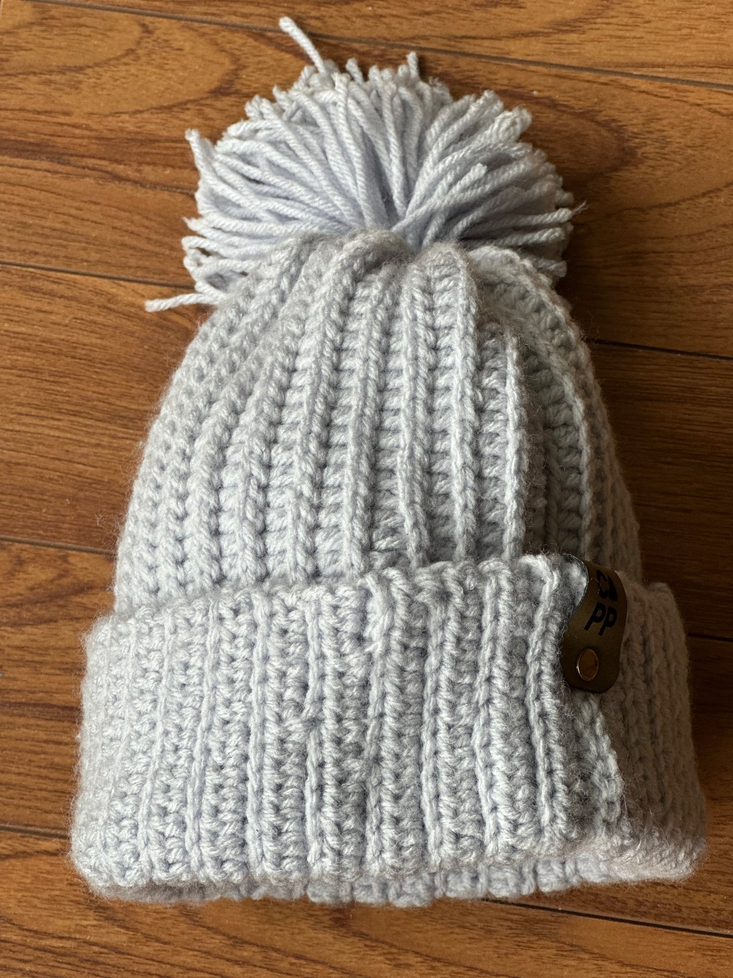 Tuque bleue ciel avec pompon
