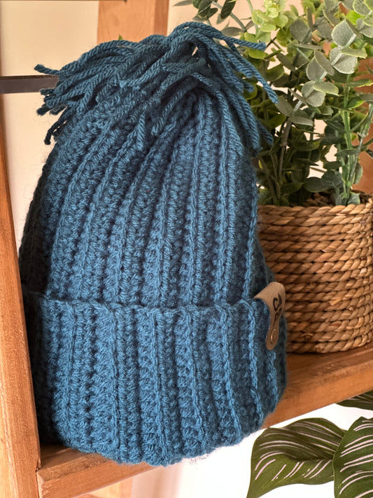 Turquoise beanie with pompom